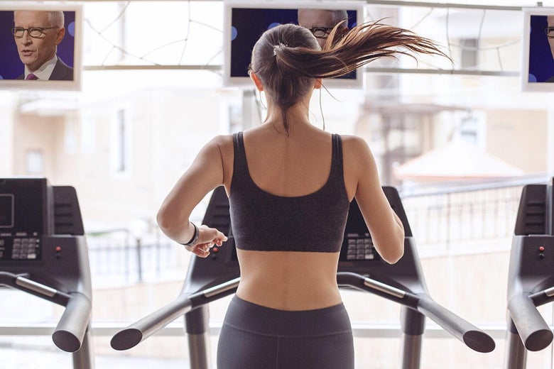 In an altered stock photo, a woman exercises as a news program featuring Anderson Cooper plays on the TV.